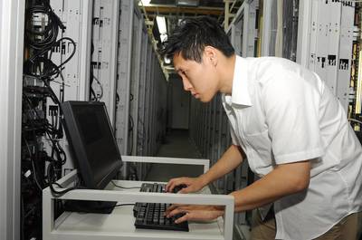 随波前行中的逐梦者 电信百年风华中的企业信息化工程